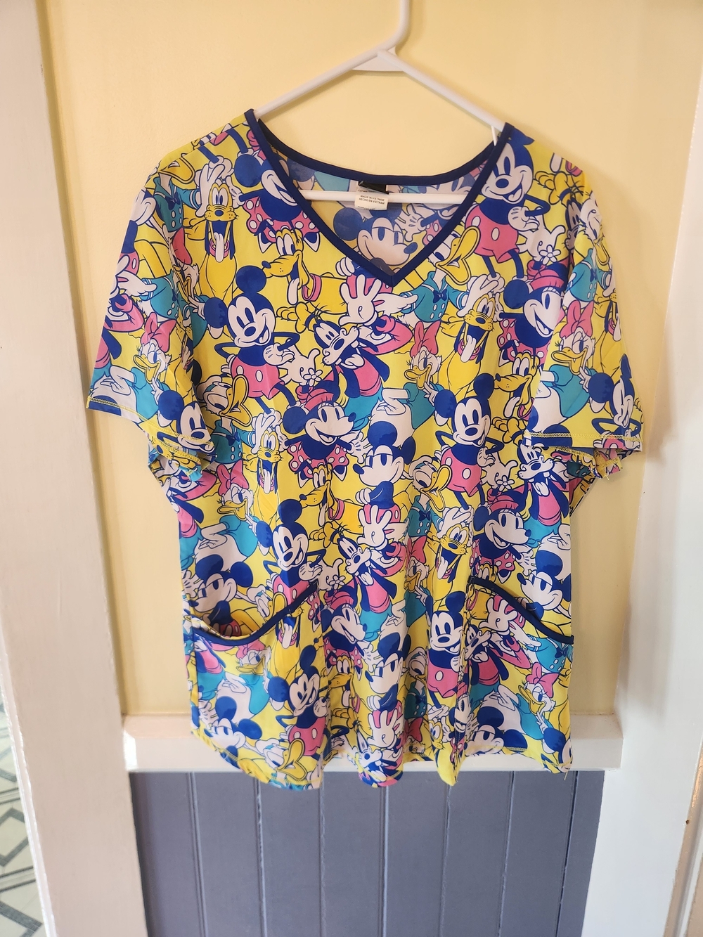 Disney V-Neck Mickey Mouse Scrub Top in Yellow and Blue Cartoon Print